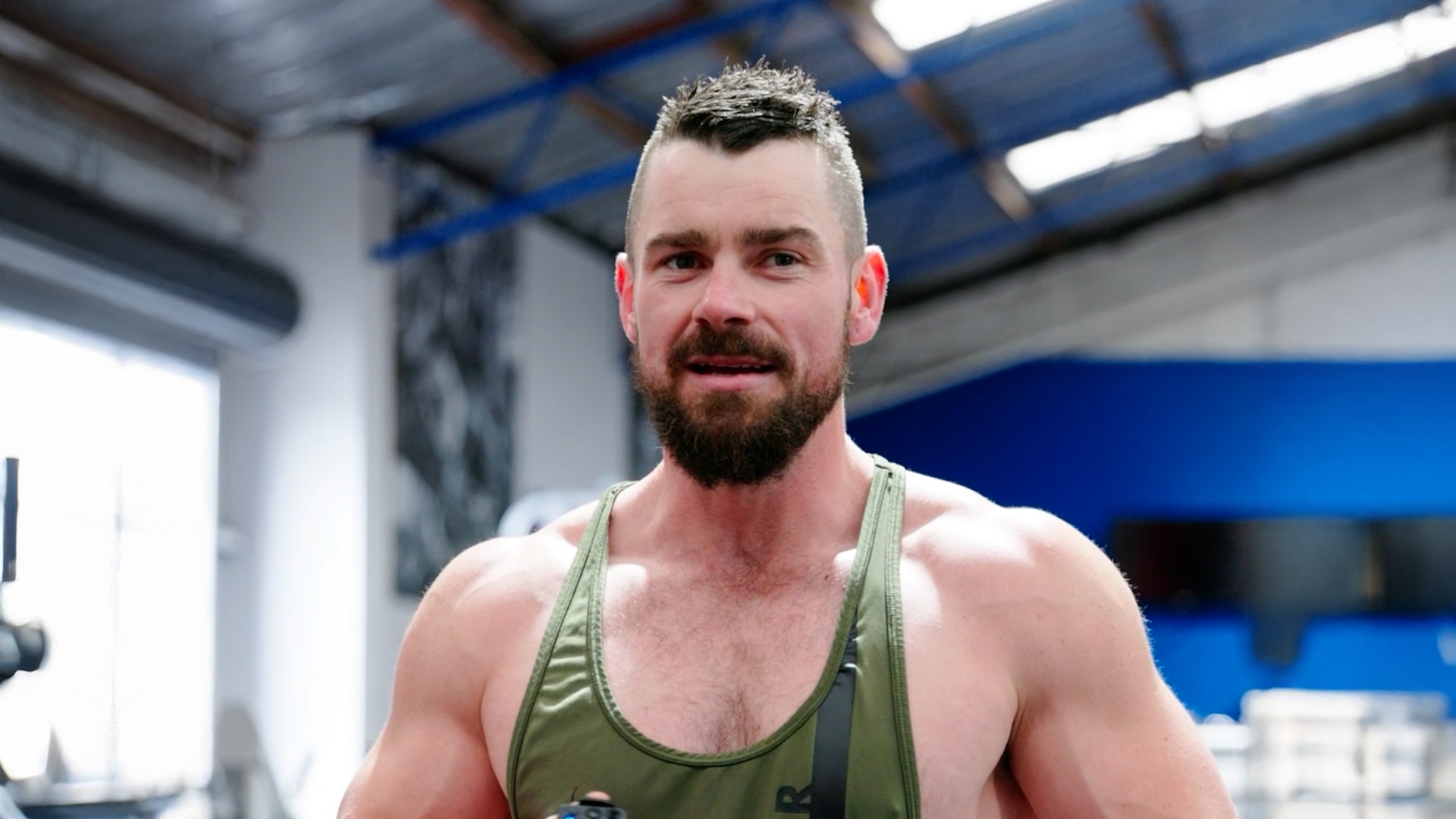 Toby Biggs, a local bricklayer from Ballarat, lifts a dumbbell at Genesis Ballarat.